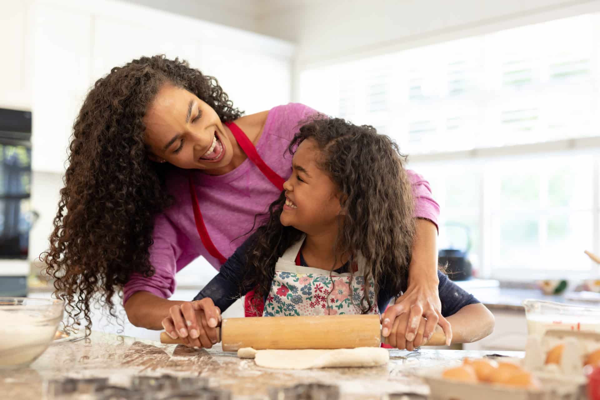 Family making Christmas cookies at home